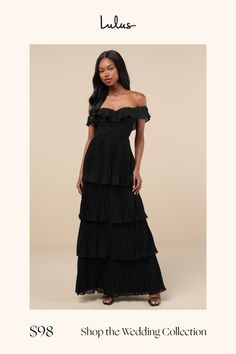 a woman in a long black dress with the words shop the wedding collection on it