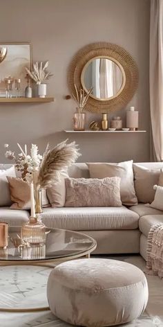 a living room filled with lots of furniture and decor on top of a white floor