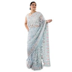 Introducing our latest and most beautiful saree yet - the Pure net saree with heavy embroidery in Sky Blue. This saree is simply stunning, with its delicate net fabric and intricate embroidery work. The sky blue color is perfect for any occasion, whether you're attending a party or a wedding. And the best part is that the matching blouse piece is included, so you can stitch it to any size! Don't miss out on this gorgeous saree, order now! A matching Petticoat can be purchased separately for an additional cost. Please mention in the notes section during checkout * AllSizes implies that the blouse is unstitched and can be stitched into any Size #chirosbyjigyasa #indianclothingusa Festive Net Pre-draped Saree In Traditional Shape, Semi-stitched Lace Saree With Sheer Dupatta, Blue Pre-draped Saree With Chikankari Embroidery, Eid Zari Work Pre-draped Net Saree, Eid Net Saree With Zari Work, Festive Bollywood Net Pre-draped Saree, Designer Net Saree For Eid, Designer Net Pre-draped Saree, Diwali Net Pre-draped Saree In Traditional Drape