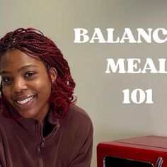 a woman sitting in front of a red box with the words balance meal 101 on it