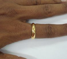 22kt gold ring from rajasthan india. Plain handmade ring made of 22kt yellow gold, good for jewelry collection. Usa ring size - 8 (we can adjust the size) Width of top - 4 mm weight - 6.5 grams Material - 22kt gold. Yellow Gold Temple Jewelry Rings For Formal Events, Formal Yellow Gold Temple Jewelry Rings, Gold Temple Jewelry Rings For Anniversary, Yellow Gold 22k Temple Jewelry Rings, 22k Yellow Gold Temple Jewelry Rings, Temple Jewelry 22k Yellow Gold Rings, 22k Gold Round Rings For Marriage, 22k Gold Certified Wedding Rings, Temple Style Yellow Gold-plated Rings