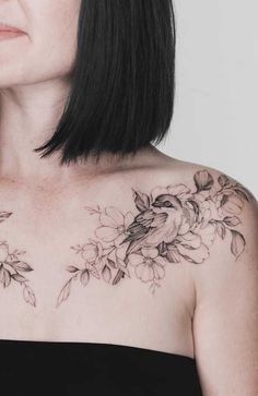 a woman with flowers on her chest