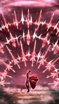 a man standing on top of a beach under a sky filled with red and white fireworks