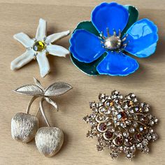 This Is A Lot Of 4 Vintage Pins / Brooches. 2 Vintage Brooches Are By Sarah Coventry (The Golden Cherries And The Blue Tahitian Flower), The Other 2 Are From Different Costume Jewellery Designers, All 4 Are Stamped / Signed And In Good Condition.All Vintage, All Beautiful!!! Sold As A Lot Of 4 Only, Price Is Firm, No Offers, Sorry! All Pictures Are Part Of Description. Sarah Coventry Jewelry Vintage, Sarah Coventry Jewelry, Sarah Coventry, Vintage Pins, Coventry, Vintage Brooches, The Golden, Blue Gold, All Pictures