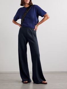 La Ligne's 'Colby' pants are the ideal combination of elevated and comfortable. Made from woven fabric with slubbed details, they have an elasticated, high waistband and soft folds along the wide legs. Wear yours with a crisp collared shirt or one of the label's striped sweaters. Wide Leg Navy Pants, Striped Sweaters, Winter Work Wear, Flat Dress Shoes, Online Closet, Dress Flats, Sport Swimwear, Sports Skirts, Wool Pants