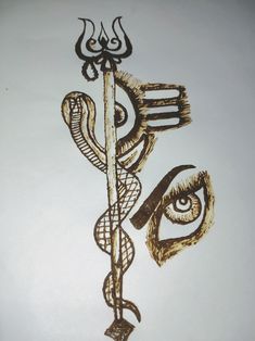 a drawing of an eye with a rod and snake on it