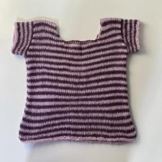 striped knit top in purple and pink! repop  lightweight and airy knit top with cap sleeves, created with a blend of cotton/mohair/acrylic yarn  size s/m measurements:  bust - 16.5" length - 19" sleeve length - 2.5"  tags~ knit top, striped top, mohair top, handmade knit, knitting, mohair, purple top, pink top, cap sleeves