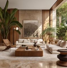 a living room filled with furniture and plants