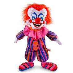 a clown stuffed animal with red hair and blue eyes is standing on a white background