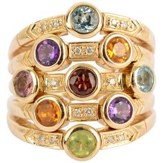 Fashionable ring by Sonia B with five bands that merge as one on the shank. The ring has nine stones that include: amethyst; citrine; peridot; blue topaz and tourmaline. Between the stones are diamonds for some added sparkle. The ring is size 6 3/4 and can easily be sized up or down. It measures 7/8" in the center from front to back. Oval Vintage Engagement Ring, Nine Stones, Ladies Gold Rings, Antique Cocktail Ring, Rose Gold Oval Engagement Ring, Multi Band Ring, Pink Gold Rings, Gemstone Diamond Ring, Diamond Cocktail Ring