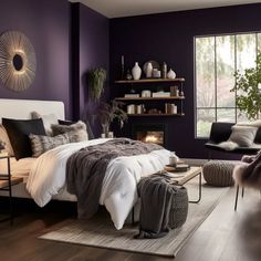 a bedroom with purple walls and white bedding in the center, along with a fireplace