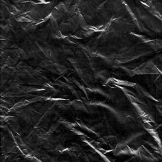 black and white photograph of wrinkled paper