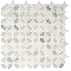 a white and green tile with circles on it