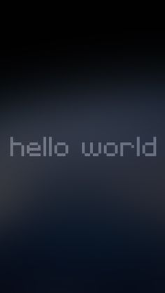 the words hello world are displayed on a dark background