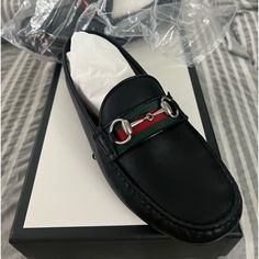 Soft Calf Leather Green And Red Web Enameled Interlocking G Horsebit Rubber Sole Made In Italy About The Brand First Launched In 1921 By Guccio Gucci, The Italian Luxury Fashion House Quickly Became Known For Its Fine Leather Craftsmanship And Accessories. Under The Helm Of Creative Director Alessandro Michele Since 2015, The Brand's Opulent Designs Include Shoes, Clothing And Accessoriesoften Boasting The Iconic Horsebit Motif. Less Leather Horsebit Loafers, Luxury Leather Loafers With Horsebit Detail, Designer Calf Leather Loafers With Horsebit Detail, Gucci Black Loafers With Leather Lining, Designer Gucci Loafers With Leather Lining, Gucci Black Flat Loafers, Gucci Black Leather Loafers, Gucci Casual Black Loafers, Designer Leather Loafers With Red Sole