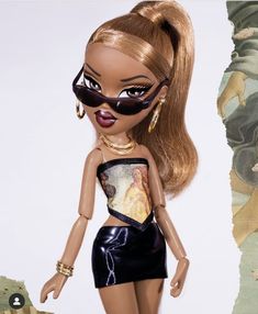 a barbie doll wearing a black leather outfit and sunglasses with her hair in a pony tail