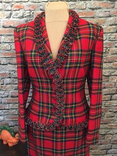 "The MOST Fabulous find and just in time for the holidays! Outstanding workmanship and detail in this GIVENCHY red Christmas plaid skirt suit, please take notice of all the lovely details. Flat front lined, side zipper skirt. Amazingly fitted lined jacket with five covered gold accented buttons. Ruffled trim on neckline, hem and back detail. I garrentee you will not see another suit like this. Take notice how every plaid line is perfectly matched. Truly an amazing piece! Made in France, tagged a Givenchy Couture, Tartan Fashion, Red Plaid Skirt, Vintage Givenchy, Womens Suits, Zipper Skirt, Vintage Suits, Y2k Clothing, Gorgeous Clothes