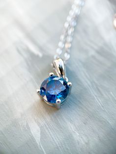 💎 Stunning Blue Topaz Faceted Pendant💎 Sterling Silver with light refraction like crazy! 🌟 A lovely gift for a bride or bridesmaid. 💐 📿 18" Sterling Silver Cable Chain **Details - 🔹 Lab-made Topaz Gemstone: 10mm x 10mm - 📏 Pendant Length: About 16mm Simply gorgeous! 😍 Matching earrings available.  November Birthstone 🎂 Thank you for looking! 🙏 Lisa 🌟 Shop Now at https://www.etsy.com/ca/shop/PersonalizedByLD🌟 Shipping INFO Canada:  Free Shipping =Standard shipping no tracking availabl Light Blue Sapphire Jewelry Gift, Light Blue Sapphire Jewelry For Gift, Blue Brilliant Cut Necklace Gift, Blue Brilliant Cut Necklace For Gift, Blue Necklaces With Prong Setting For Gifts, Blue Round Cut Necklace As Gift, Light Refraction, Presents For Wife, November Birthstone