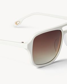 A new take on aviator sunglasses in a bold, oversized shape, handmade from Italian acetate. Fitted with UV 400 lenses for the highest level of protection. Classic White Aviator Sunglasses With Gradient Lenses, White Aviator Sunglasses With Uv Protection, Modern White Aviator Sunglasses, White Aviator Sunglasses With Tinted Lenses, Modern White Aviator Sunglasses With Polarized Lenses, White Aviator Sunglasses For Summer, Modern White Aviator Sunglasses With Uva Protection, Hoop Charms, Fall Essentials