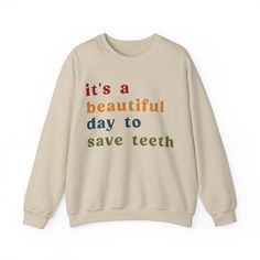 It's A Beautiful Day To Save Teeth Sweatshirt, Dental Student Sweatshirt Orthodontist Sweatshirt, Doctor of Dental Surgery Sweatshirt 💫Ideal for any situation, a unisex heavy blend crewneck sweatshirt is pure comfort. 💫 Made with a medium-heavy fabric blend of 50% cotton and 50% polyester, this sweatshirt feels cozy and is the perfect choice for those colder months. 💫 Made using 100% ethically grown US cotton. Gildan is also a proud member of the US Cotton Trust Protocol ensuring ethical and Dental Student, Dental Surgery, A Beautiful Day, Environmental Impact, Heavy Fabric, Beautiful Day, Surgery, Crewneck Sweatshirt, Crew Neck Sweatshirt