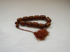 "Vintage folk Greek big handmade wooden decorative worry beads \" koboloi\" Good vintage condition. Full Length with cord 30 cm. All my packages are registered and you will be olso receiving tracking number. Please ask if you have any questions. Visit our shop for more colector's items. https://www.etsy.com/shop/prestigiousantiques?ref=hdr" Traditional Brown Beads For Rituals, Traditional Hand-strung Brown Beads, Traditional Beaded Brown Rosary, Traditional Brown Beaded Rosary, Traditional Brown Rosary With Round Beads, Traditional Adjustable Brown Rosary, Brown Wooden Beads For Festivals, Traditional Large Brown Beads, Traditional Brown Large Beads