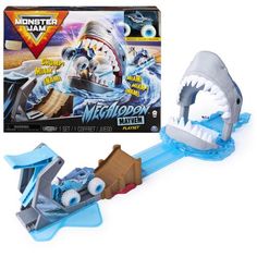 a toy that is in the shape of a shark with wheels and teeth on it