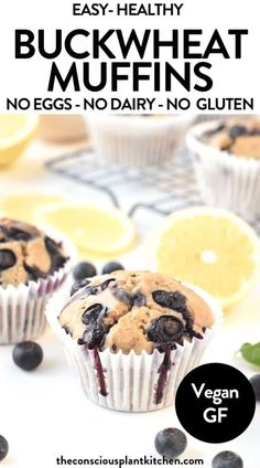 two blueberry muffins with lemon slices on the side and text overlay reads easy healthy buckwheat muffins no eggs - no dairy no gluten