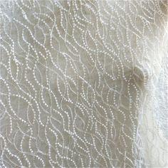 ❤Super gorgeous, exquisite embroidery flowers. Highly recommended to brides! ! ❤ Very delicate and romantic. It can be used for wedding decorations, boho dresses, bridal outfits, tops, clothing fabrics, corsets, curtains, etc... Size Width: 130cm (51 inches) This listing is for 1 yard. Wholesale Available If you need more, please feel free to contact me for a custom list. We usually process your order within 3-5 days, standard shipping will take about 10-15 days, some country may need more time. White Pearl Embroidered Fabric For Mother Of The Bride, Cream Wedding Embroidered Fabric, White Organza Embroidered Fabric For Wedding, Elegant White Organza Sequin Fabric, Elegant White Sequin Organza Fabric, White Organza Tulle Fabric With Pearl Embroidery, White Organza Sequin Fabric For Wedding, White Sequin Organza Fabric For Wedding, White Organza Wedding Dress With Pearl Embroidery