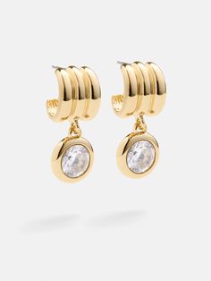 Add a sparkling statement to your jewelry set with the Lorelei Earrings. These drop earrings feature triple hoops and a large cubic zirconia stone. Wear for everyday glam or for special occasions, and watch as they elegantly dangle with every step. Everyday Glam, Gold Drop Earrings, Jewelry Set, Statement Earrings, Gold Earrings, Cubic Zirconia, Jewelry Design, Jewelry Earrings, Sparkle