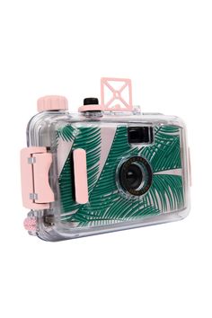 Dimensions: H9cm x W12cm x D4cm. Pink and green print waterproof camera. Waterproof 35mm film camera. 28mm, f/90 picture taking lens. Detachable waterproof casing. Focus free. Easy film loading. Thumb wheel film advance system. Features wrist strap. PLEASE NOTE: Requires 35mm roll negative film. Materials: PVC Your treasured memories matter girl! So capture every moment, including underwater with the SUNNYLIFE Underwater Camera! This funky island-theme camera is the very definition of a travel e Happy Vacation, Negative Film, Island Theme, Underwater Camera, Diy Bracelets Tutorials, Waterproof Camera, Vacay Outfits, Underwater Lights, 35mm Camera