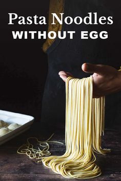 pasta noodles without egg being held by someone's hand with the words pasta noodles without egg