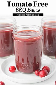 cranberry pomegranate in a jar with text overlay that reads, how to make tomato - free bbq sauce