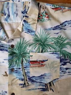 "Step into your Island style with this silky soft probably rayon blend short sleeve coconut button down pocket shirt. Sport some Palms, sail boats and outrigger canoes in this Hawaiian vibe shirt. Good used condition. Some light snags towards the bottom front at pictured. No tags on this item.  My size estimate is XXXL but might fit a bit short for a large person. Please note measurements.  Chest 32\" Sleeve 10\" Length 29\"" Collared Hawaiian Shirt With Pockets For Beach, Summer Camp Shirt With Pockets For Vacation, Summer Hawaiian Shirt With Vintage Print, Casual Hawaiian Shirt With Vintage Print For Summer, Collared Hawaiian Shirt With Vintage Print For Summer, Beach Shirt With Vintage Print And Short Sleeves, Summer Vintage Print Collared Camp Shirt, Collared Camp Shirt With Vintage Print For Summer, Vintage Print Collared Camp Shirt For Summer