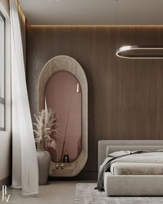 a bedroom with a round mirror on the wall next to a bed and vases