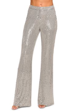 Drip in the dazzle with wide leg party pants covered in shiny sequins. 33 1/2" inseam; 25" leg opening; 10 front rise; 15" back rise (size 8) Lined 95% polyester, 5% spandex Dry clean Imported Glamorous Rhinestone Bottoms, Glamorous Rhinestone Party Bottoms, Elegant Rhinestone Party Bottoms, Embellished Stretch Bottoms For Evening, Stretch Embellished Bottoms For Evening, Glamorous Fitted Pants With Rhinestones, Glamorous Fitted Pants For Gala, Glamorous Embellished Bottoms For Evening, Glamorous Evening Pants With Rhinestones