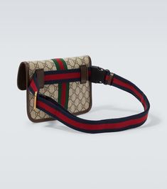 Ophidia GG Small Canvas Belt Bag in Beige - Gucci | Mytheresa Brown Leather Gucci Belt Bag, Gucci Brown Leather Belt Bag, Luxury Coated Canvas Belt Bag For Everyday, Gucci Canvas Bags With Gold-tone Hardware, Luxury Belt Bag With Leather Trim For Travel, Luxury Travel Belt Bag With Leather Trim, Luxury Leather Trim Belt Bag For Travel, Gucci Rectangular Bag With Logo Strap, Designer Belt Bag With Removable Belt For Everyday Use