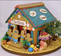 a gingerbread house is decorated with decorations