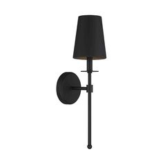 a wall light with a black shade on it