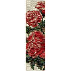 cross stitch bookmark with red roses on it