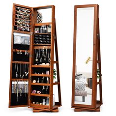 a wooden jewelry cabinet with mirrored door and mirror on the bottom shelf next to it