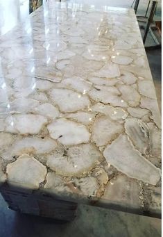 a large marble table top in a store