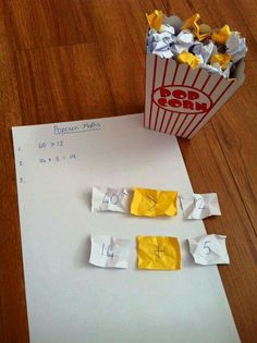 a paper bag and some yellow pieces of paper