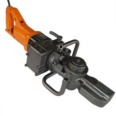 an orange and black machine is on a white surface with the handle extended to it's side