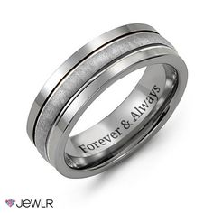 a wedding ring with the words forever and always engraved on it's center band