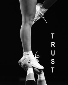 a black and white photo of a person's feet with the words trust in front of them