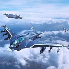 four fighter jets flying in the sky above clouds and land, with one jet on its side