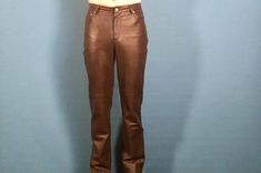 Vintage 80's brown soft leather pantsButton closure Traditional zippered flyFour outside pockets plus small functional coin pocket Fixed nylon liningExterior is in excellent condition with minimal wear Interior is in great conditionLabels are intactName on label - Newport NewsSize on label - 6Approximate Measurements:Waist 28"Upper Thigh 20"Inseam 32"Once the item is in your cart you may select the shipping method that works best for you.Here at This Vinyl Life, we aren't so much concerned with Brown Leather Pants, Run To You, Black Leather Pants, Newport News, Black Leather Jacket, Vintage Leather, Newport, Favorite Things List, Real Leather