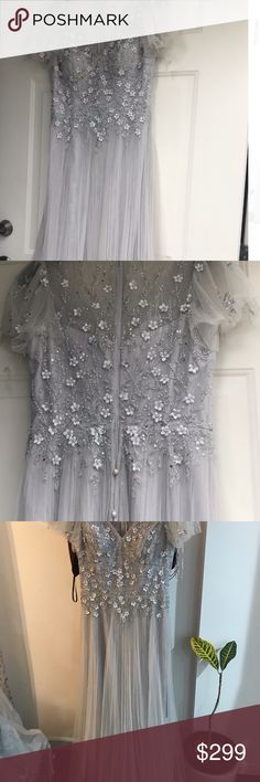 two dresses hanging up in front of a door with the words poshmark on it