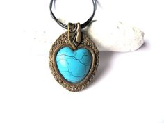 "Blue heart necklace Boho necklace Turquoise necklace Turquoise colour jewelry Gift for her Boho jewelry Bohemian Love heart Boho necklace Ready to ship .  Beautiful Turquoise colour Boho necklace I made  from polymer clay .  Turquoise \"stone\" I made  from polymer clay it is a handmade replica of Turquoise stone . Size   Pendant height 5.5 cm / 2.16 '' Pendant width  4 cm / 1.57 '' Necklace length 52 cm / 20.47 '' Shipping This handmade item is in stock & ready to ship! Shipping in 1-3 busines Turquoise Heart Charm Pendant Necklace, Turquoise Pendant Necklace With Heart Charm, Unique Turquoise Heart-shaped Jewelry, Unique Heart-shaped Turquoise Jewelry, Turquoise Heart Beads Necklace As Gift, Adjustable Turquoise Heart Pendant Jewelry, Turquoise Necklace With Heart Beads As Gift, Handmade Bohemian Heart Pendant Jewelry, Handmade Blue Heart Turquoise Necklace