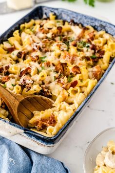 a casserole dish filled with pasta and meat